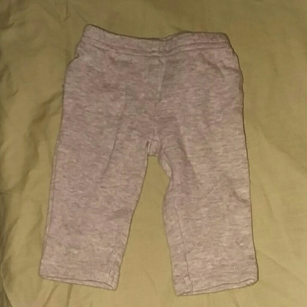 Gray pants with a ruffle on the butt